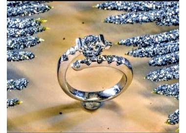 Anello in oro bianco con diamanti taglio brillante centrale di Kt 0.50 e totale laterali Kt 0.30 MG.05 GIOIELLERIA 3.900,00 €